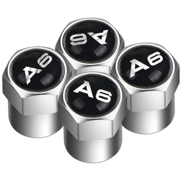 Bouchons de valve Audi + porte-clés dans une boîte cadeau pour les  passionnés d' Audi .